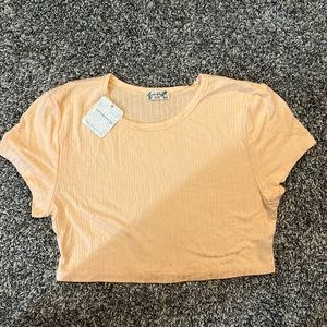 free people, never worn women’s cute crop top, small